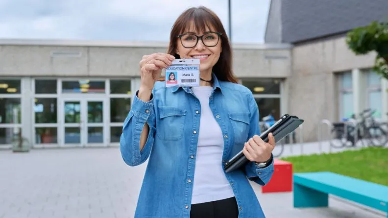 university student showing id card